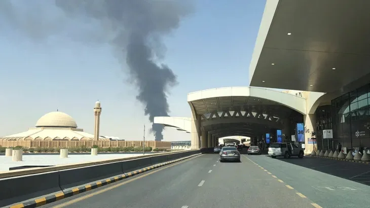 Smoke billows from the King Khalid International Airport on October 10, 2026