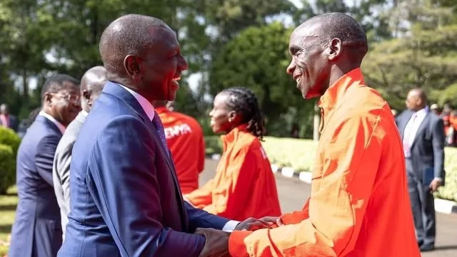President William Ruto greets marathon Champion Eliud Kipchoge during a past event.
