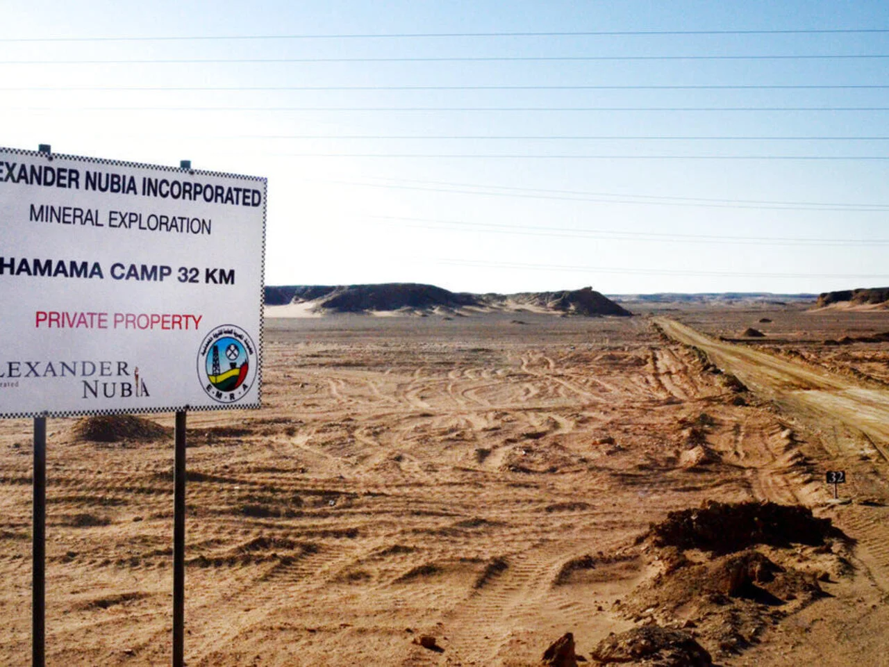 Photo shows a sign marking the turn-off leading to the Hamama gold exploration site, deep in the desert east of Luxor, Egypt on April 15, 2016.